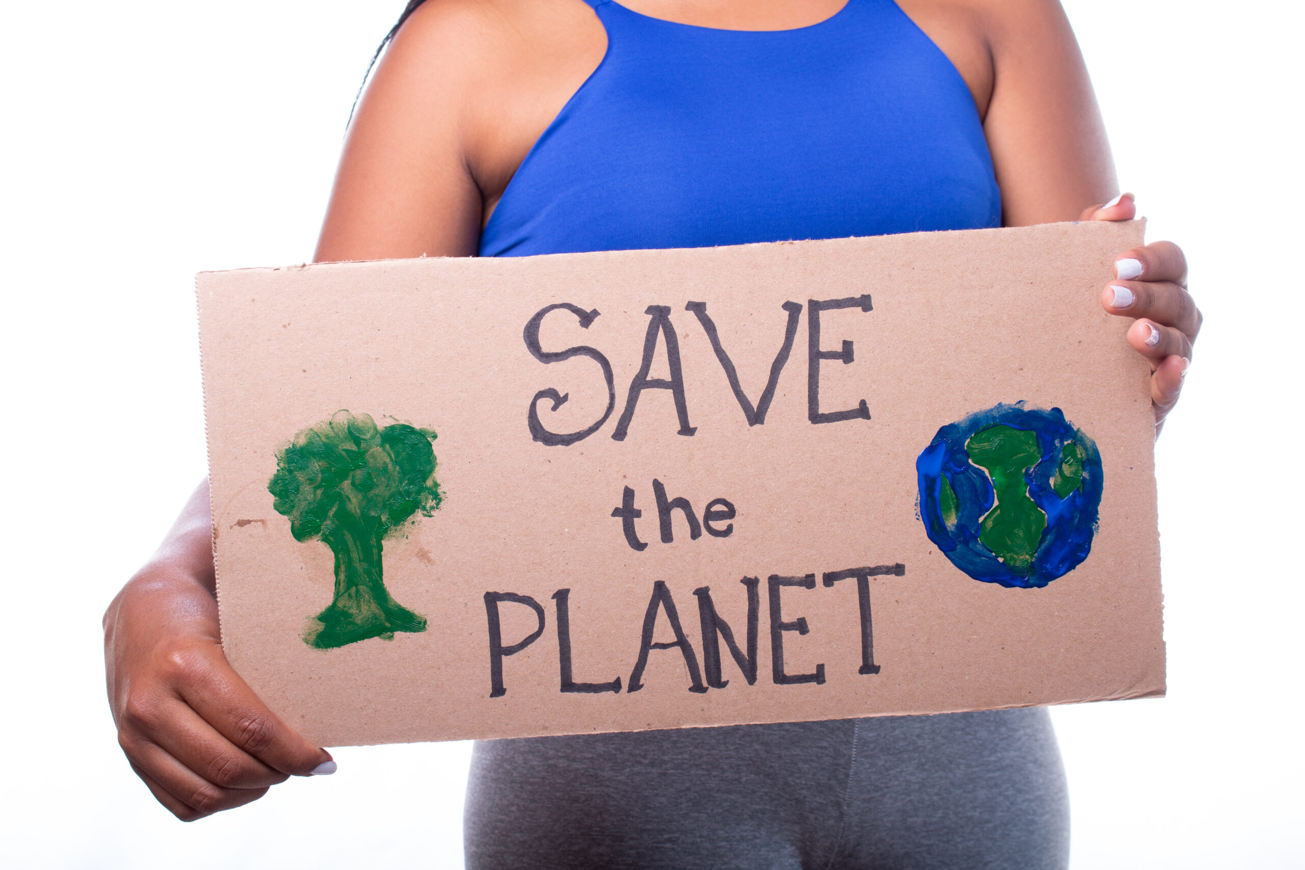 Saving the planet. Brunette woman holding a sign saying save the planet, Isolated on white background. Unknown woman protests for world ecology.